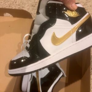 Jordan Black and Metallic Gold Sneakers
